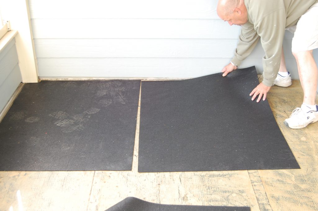 Laying Protection Mat for Composite Deck Tiles