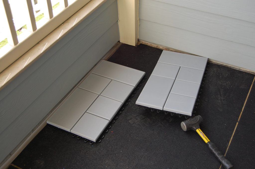 Begin laying Composite Deck Tiles on the outside Edge