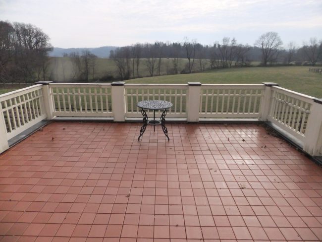 Composite Deck Tiles With Leaves, Dirt and Debris Composite Deck Tiles With Leaves, Dirt and Debris
